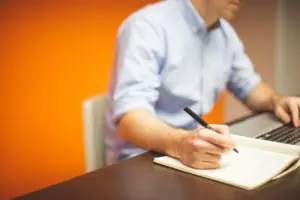 A laptop on a desk, representing technology and news reading online