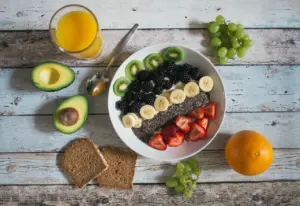 A colourful healthy breakfast bowl with fruit, representing healthy food topics