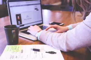 A laptop on a desk, representing the tech writing in the Tech Table section
